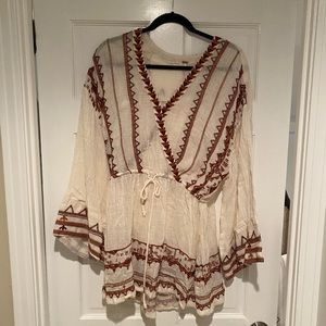 free people top. never worn. tags taken off. condition 10/10